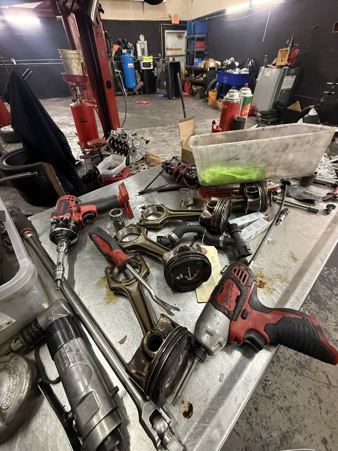 Pistons and connecting rods laid out from the B46