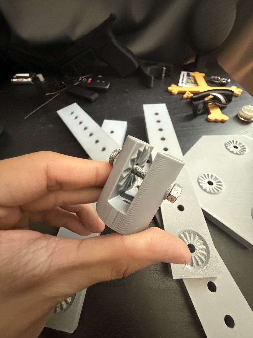 Close-up of the printed height-adjust sleeve with locking screw