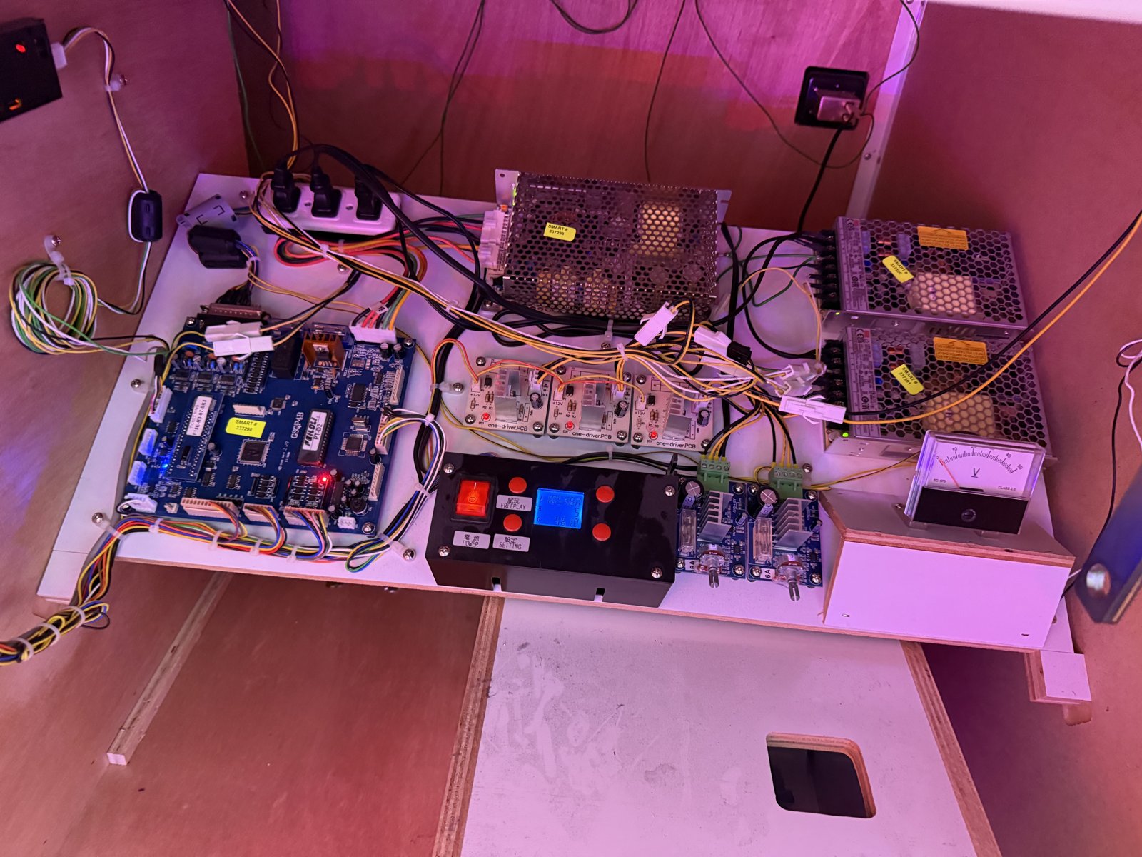 PCB repair bench with boards mid-repair