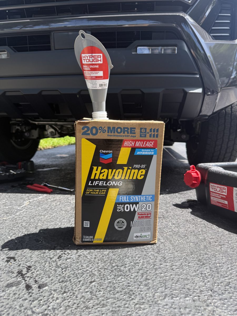 Havoline Pro-DS Lifelong full synthetic 0W-20 oil box with funnel, under the Tacoma's rear bumper